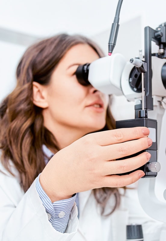 woman getting eyes tested