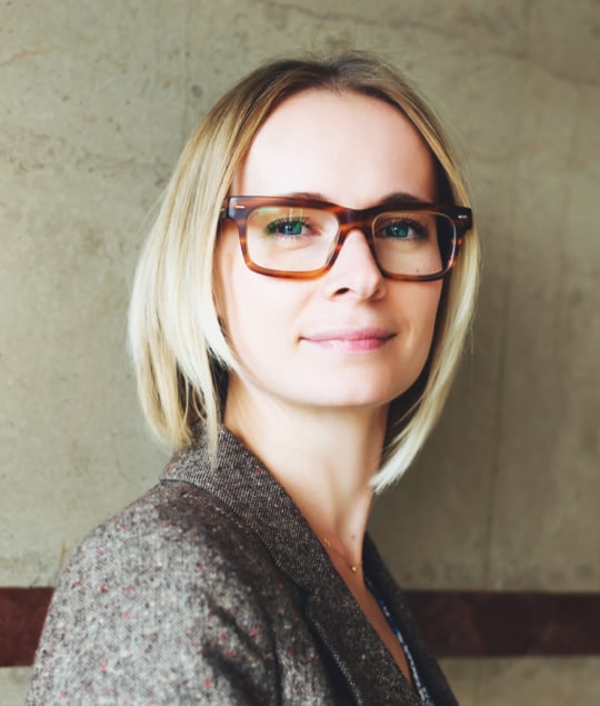 blonde woman wearing glasses