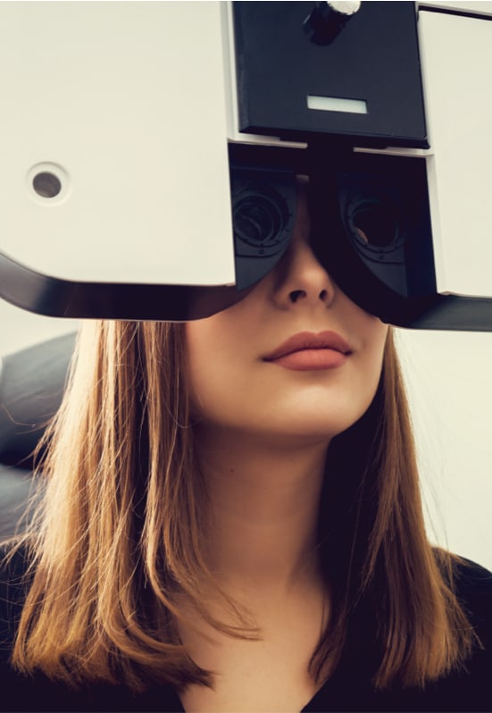 woman getting eyes tested